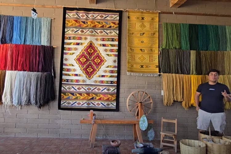 Handmade rugs on display at a weaving factory and store