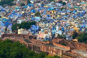 An aerial view of Jodhpur, India—its iconic blue houses spreading across the old city like a watercolor. Photo by Babitha Balakrishnan