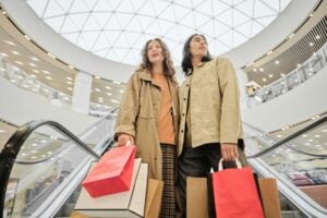 A couple with shopping bags at a mall