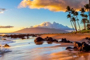 Beautiful beach sunset in Maui. Photo by Matt Anderson from Getty Images Pro via Canva