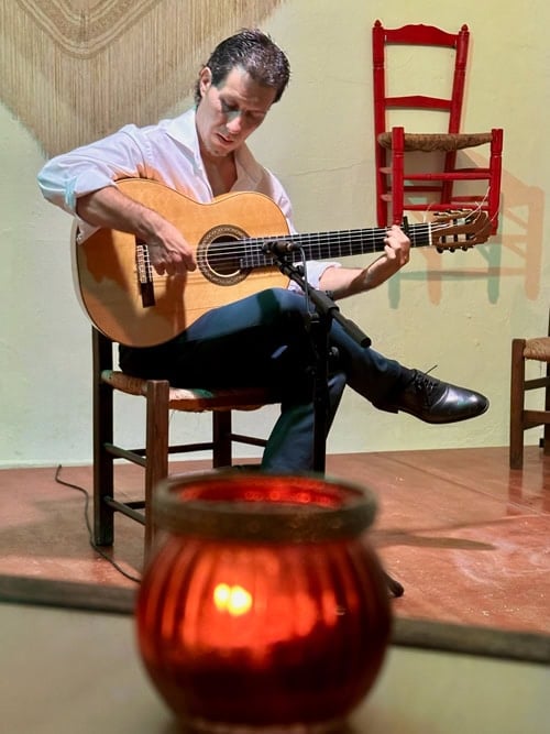 Flamenco guitar performance at Tablao Flamenco Los Molinos, Arcos de la Frontera, Spain