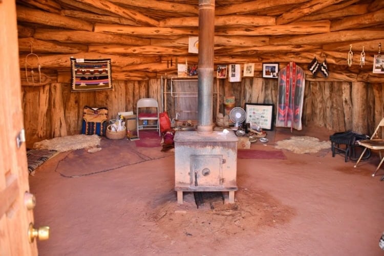 Inside a female Hogan where rugs were being produced in a family village in Monument Valley. Photo by Tab Hauser