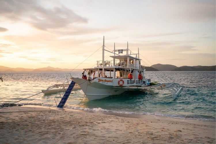 The mighty 26-metre Katrina Alexandria with dual outriggers to help get through the roller coaster of waves. Photo by Mirko Freund