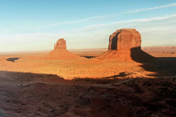 The sunset view from a private balcony at The View in Monument Valley. Photo by Tab Hauser