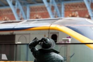 Sir John Betjeman greets the Eurostar at St Pnacras Station. Image by Backyard Productions via Canva