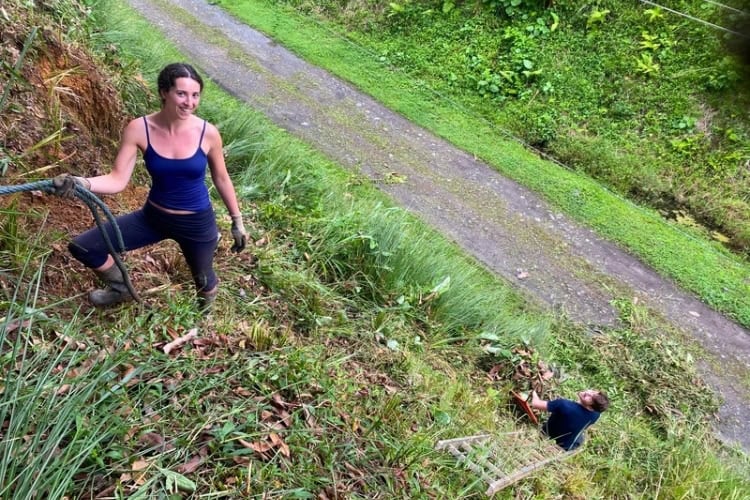 My boyfriend and I planting Vetiver grass, Costa Rica. Photo by Charlotte Hudson