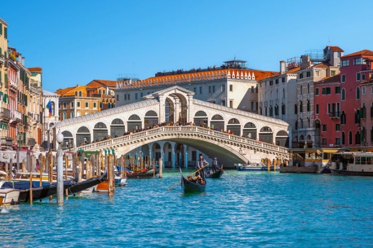 Rialto Bridge in lovely Venice. Photo by adisa from Getty Images via Canva