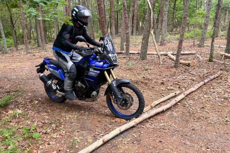 The author crosses a fallen log during off-road training in the Pine Barrens, New Jersey.