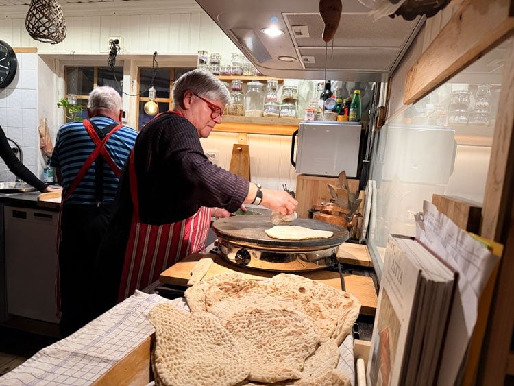 Pia and Henry making Swedish flatbread. Photo by Janna Graber