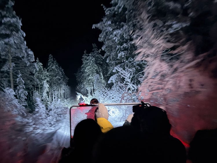 Snowmobile sled tour in Swedish Lapland. Photo by Janna Graber
