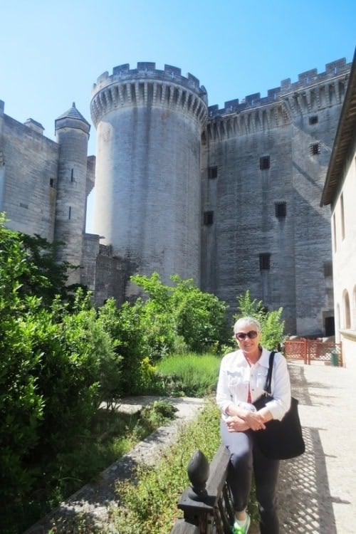 Jane enjoying gardens at Chateau Tarascon. Photo by Brent Cassie