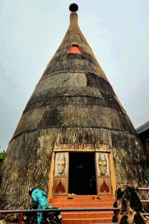 Eccentric, conical Kpakli Yaou Temple dedicated to the Zangbeto Voodoo Police. Photo by Edward Placidi