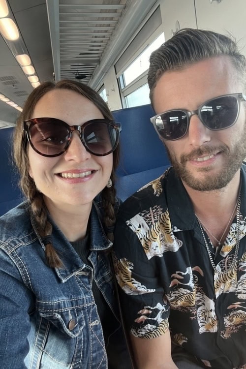 Thomas Holmes and Jessica Holmes on the train to Venice. Photo by Jessica Holmes