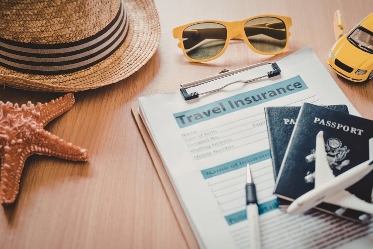 Before you pack your bags, make sure your coverage is in order. Photo by David Stanciu's Images via Canva 