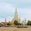 Boats in front of a temple in Bangkok, Thailand. Photo by Evan Krause, Unsplash