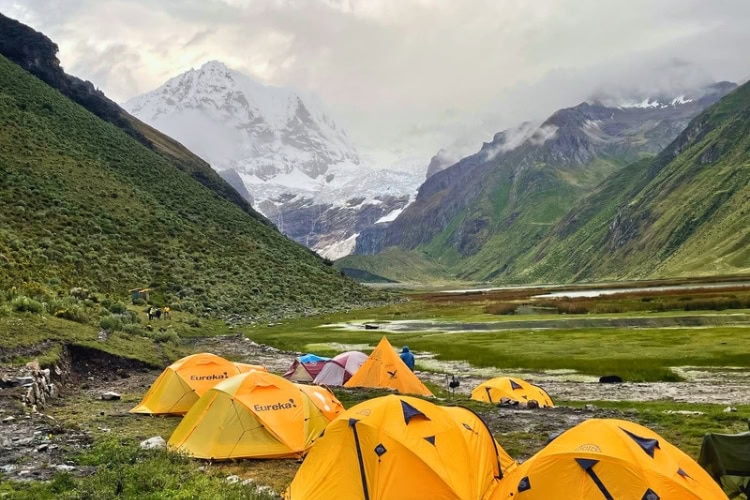 Camping by Lake Jahuacocha with views of Cordillera Huayhuash. Photo by Chana Widawski