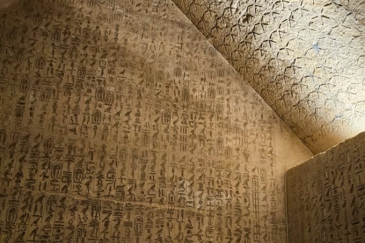 Carving covers every surface in this tomb at Saqarra. Photo by Laurie Thornton