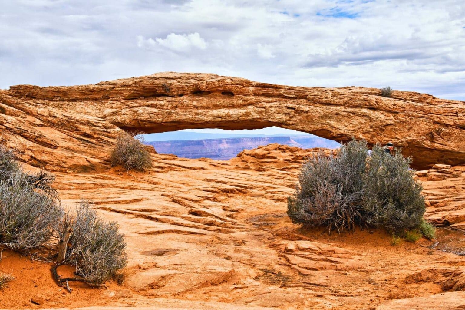 Mesa Arch, one of Canyonlands most popular stops. Photo by Tab Hauser