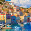 The beautiful Greek island of Symi. Photo by ianwool from Getty Images via Canva