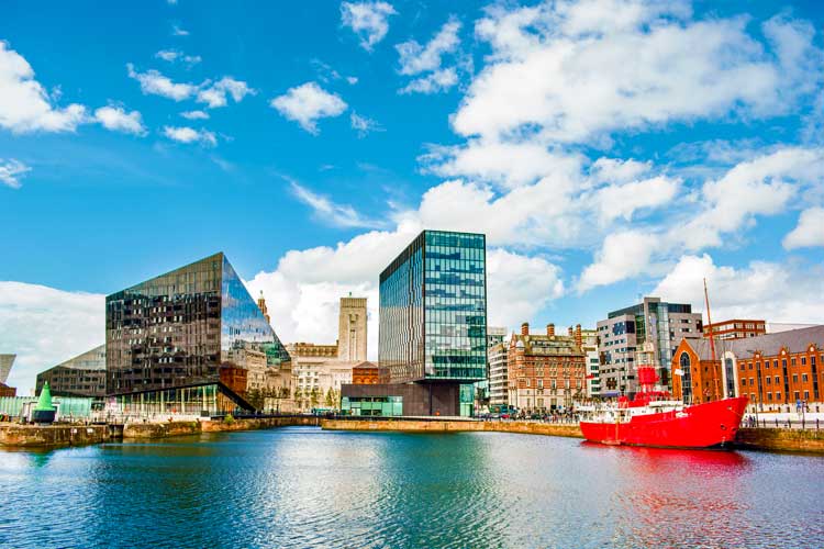Buildings in Liverpool (England) near the Mersey River. Photo by by iStock/Silvan Bachmann