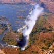 Aerial View of Victoria Falls with the international bridge to the right. Photo by Tab Hauser