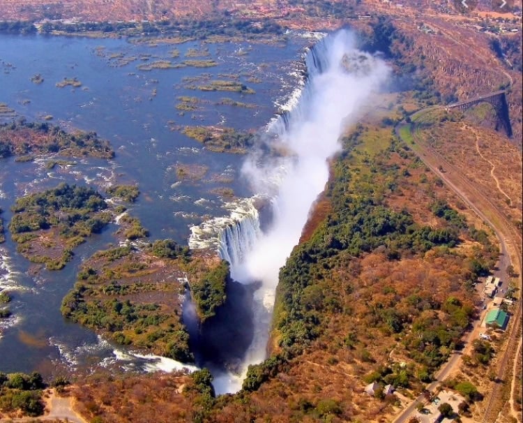 Aerial View of Victoria Falls with the international bridge to the right. Photo by Tab Hauser