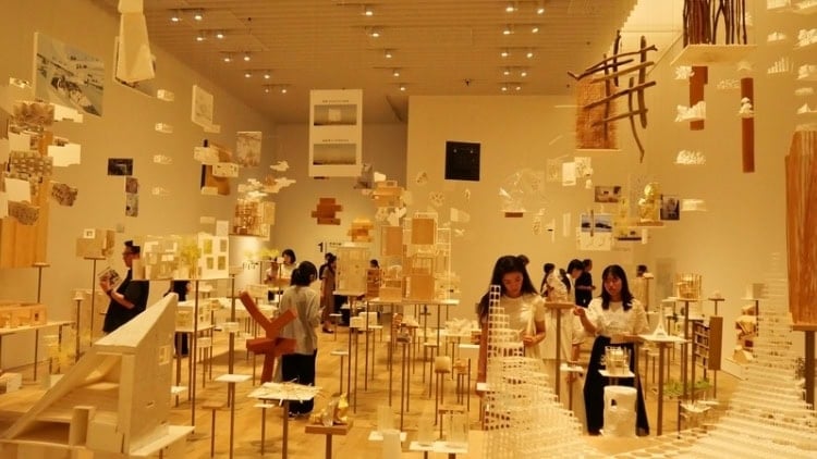 Visitors view a large collection of architectural models in the Mori Museum. Photo by Alexander Goodman