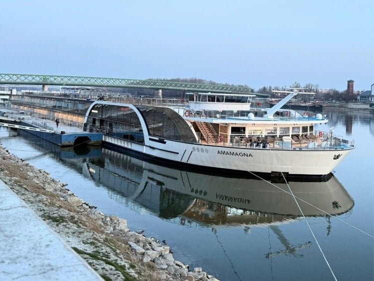 Double-wide AmaMagna riverboat stands out along the Danube River. Photo by Meryl Pearlstein