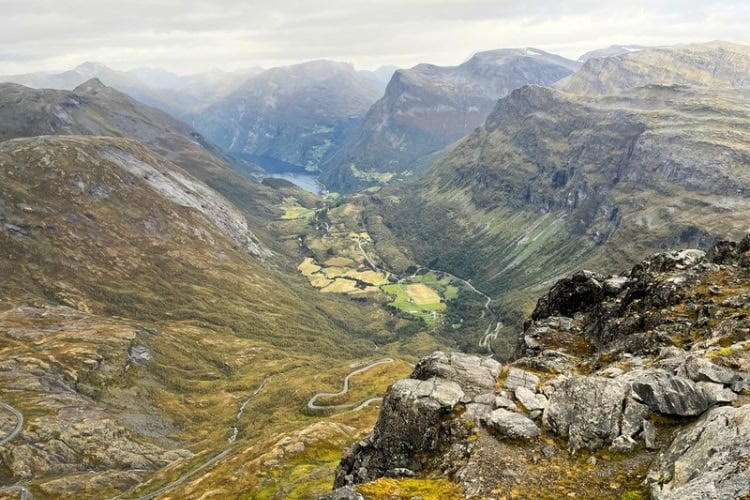 Looking down at Geirangerfjord from Geiranger Skywalk at the peak of the Dalsnibbe Mountain. Photo by Maureen C Bruschi
