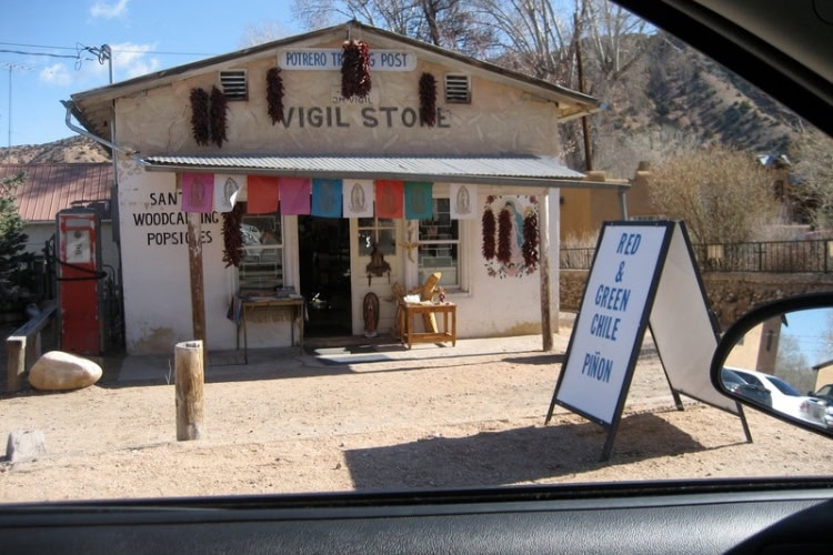 Shops filled with handwoven textiles and woodcarvings. Photo by Brent Cassie