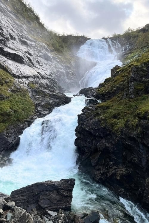 Kjosfossen Waterfall, Norway, thundering down the mountainside. Photo by Maureen C Bruschi