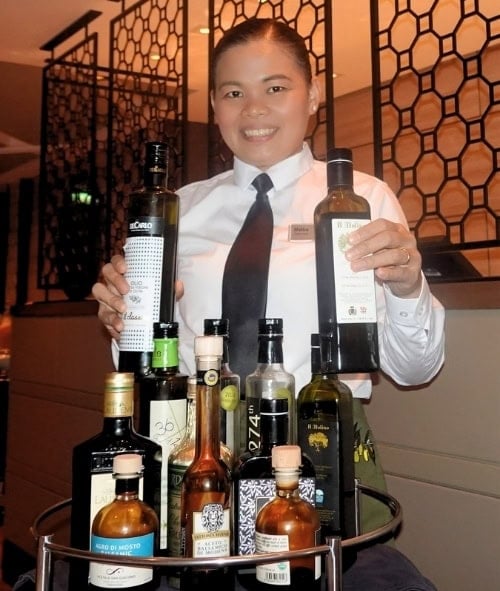Olive oil sommelier on Oceania Allura. Photo by Tab Hauser