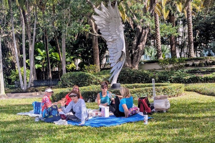 People enjoying a picnic at the Ann Norton Museum