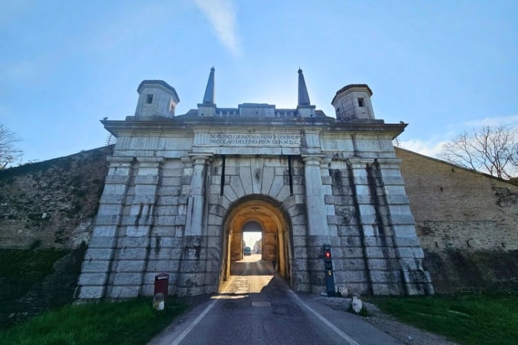 The historic Porta Udine, one of three stone gateways built into Palmanova's defensive walls. Photo by Zuzana Zimmermannova