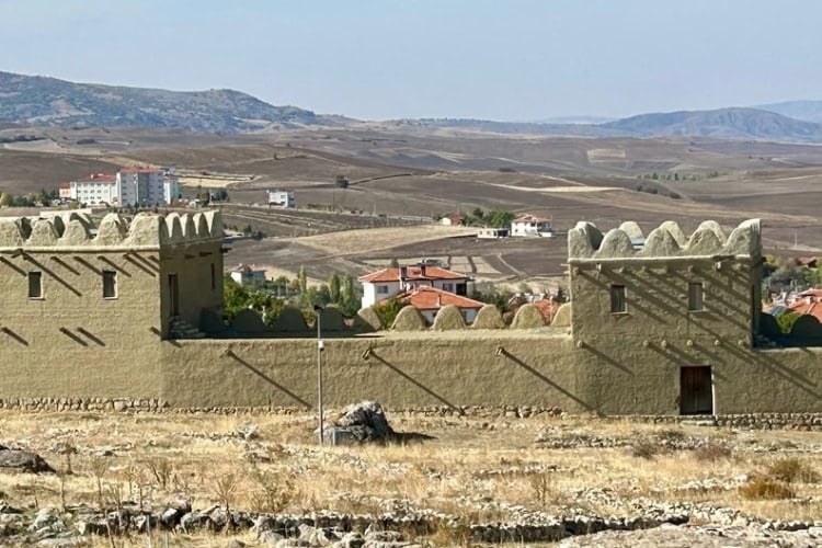 Reconstruction of wall sections and two defensive towers, mirroring original construction techniques. Photo by Paul Ehrlich