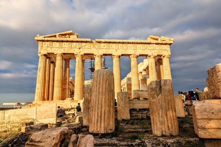 Restoration efforts are ongoing. Portions of column drums, frieze fragments, and foundation blocks litter the grounds. Photo by Frank Hosek