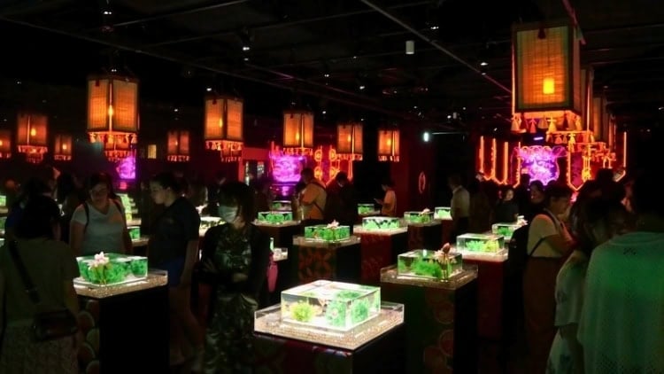 Room filled with fish in artistic displays in Tokyo's Aquarium Art Museum. Photo by Alexander Goodman