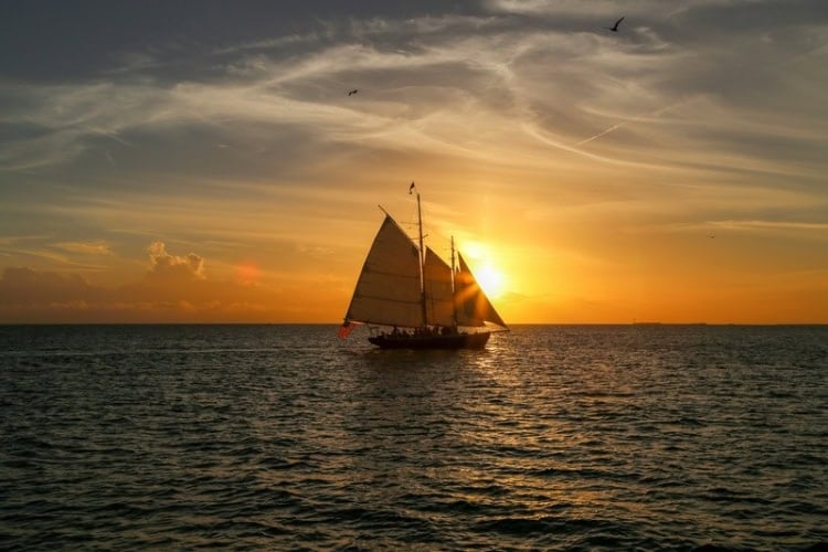 Sailing boat during sunset. Photo by Nicole Chen, Unsplash