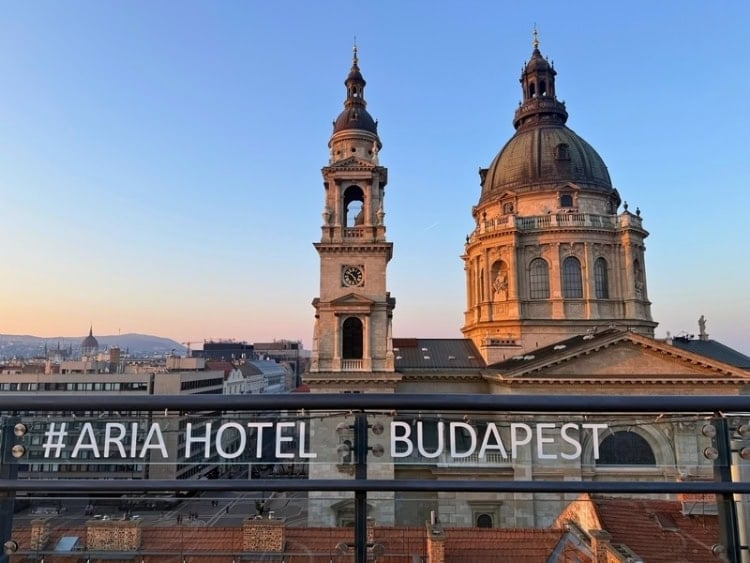 View of St. Stephen's Basilica dome and the city from Aria Hotel Budapest rooftop. Photo by Meryl Pearlstein