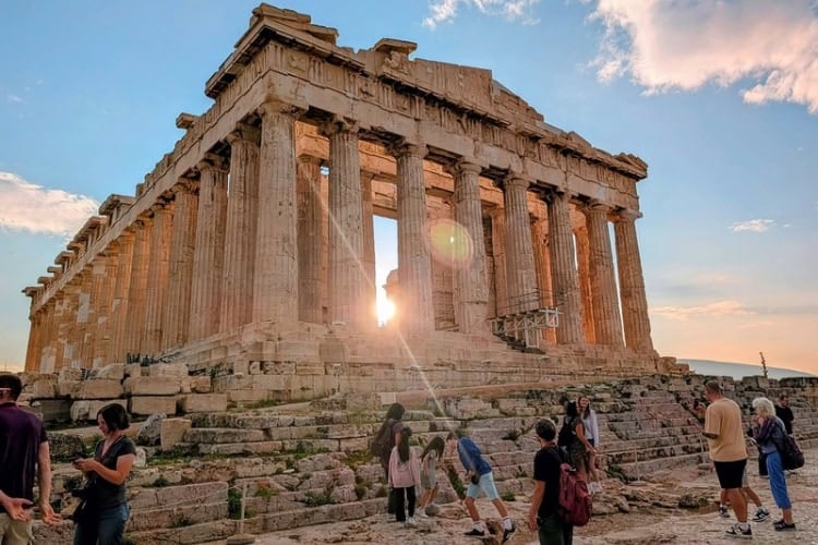The Parthenon atop the Acropolis of Athens, Greece, dedicated to the goddess Athena. Photo by Frank Hosek