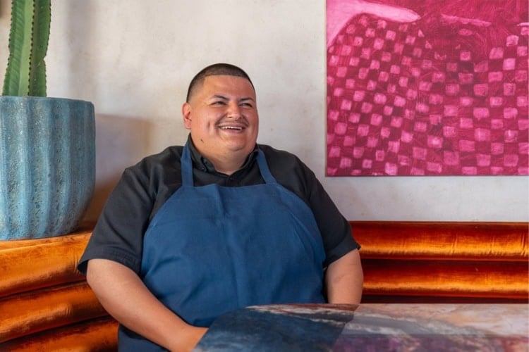 Chef Adrian Torres at Maximo restaurant, recognized by Michelin for its global flavors transformation. Photo by Carla Gomez