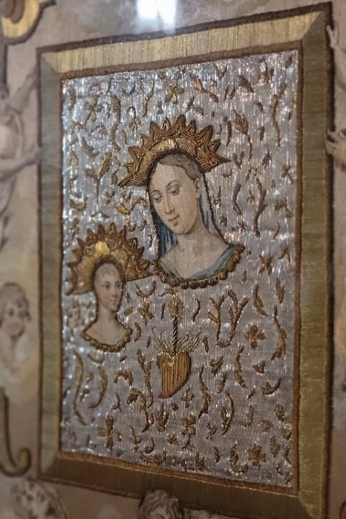 A closer look at the embroidery, made in part with human hair over two decades, going from brown to silver. Photo by Eric D. Goodman