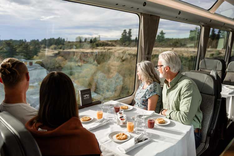 Customers enjoying the view while dining aboard Great Journeys New Zealand. Photo courtesy Great Journeys New Zealand