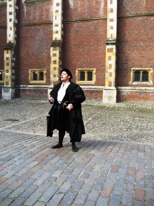 Costumed guide at Hampton Court. Photo by Brent Cassie