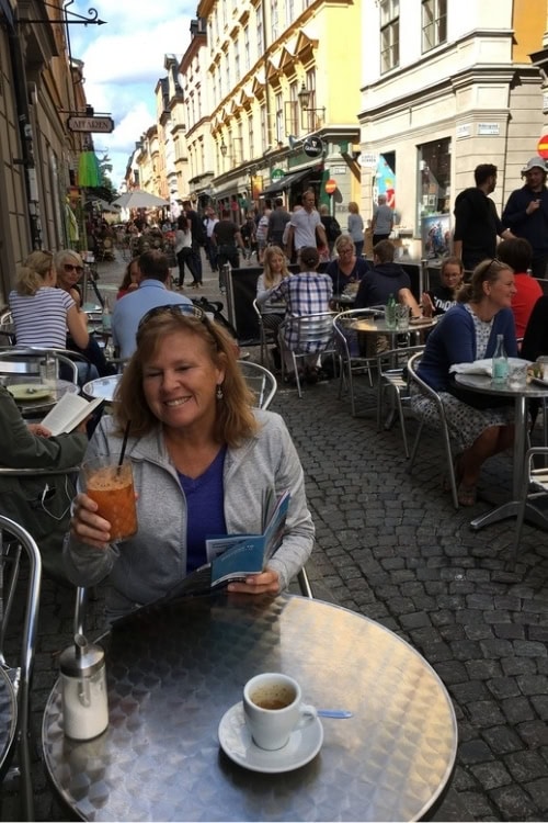 Jane enjoys dining at one of the sidewalk cafes in Old Town. Photo by Brent Cassie