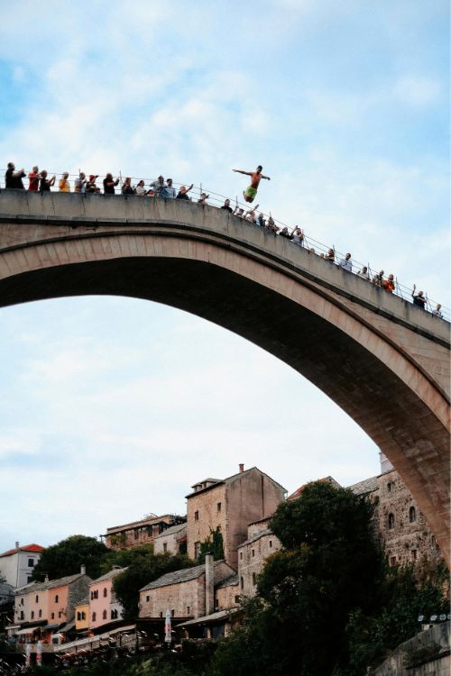 Jumping to the river far below