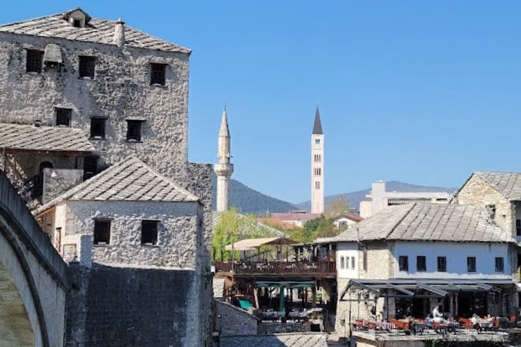 Minarets and church towers rising alongside one another in Mostar's multi-faith skyline Photo by Eric D. Goodman