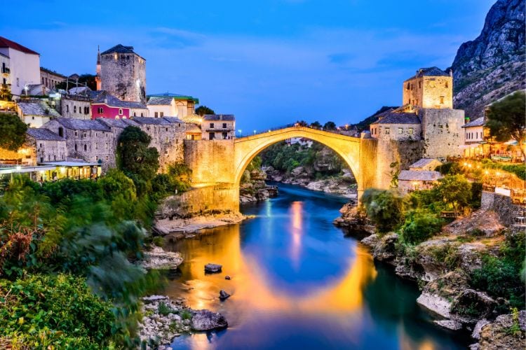 Stari Most is lit up at night