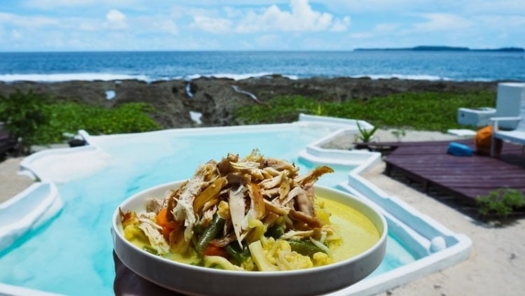 Indulge in the culinary offerings at SSL, featuring fresh fish and delicious chicken as part of Indonesia's rich cuisine. Photo by Alex Benaud