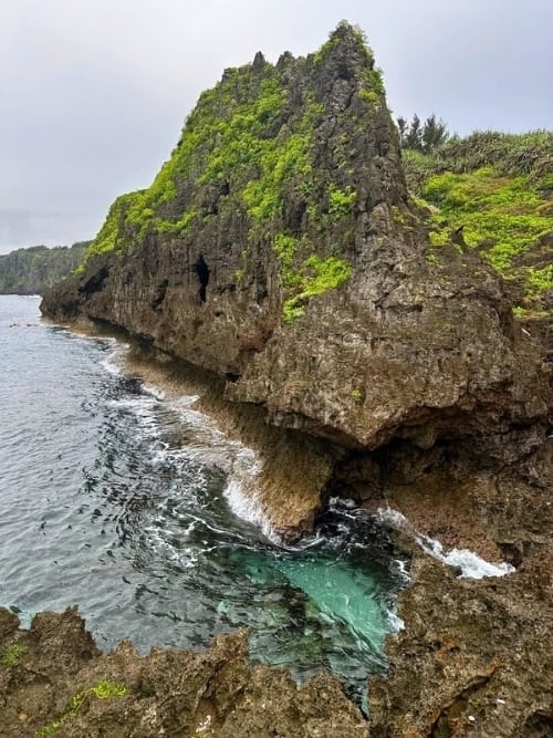 Towering limestone shorelines in Yomitan. Photo by Liv Headley